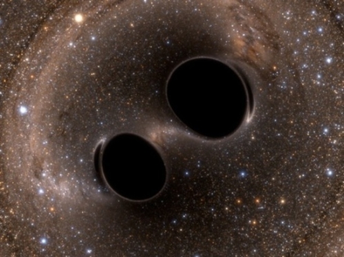 Обнаружена пара черных дыр, готовых встряхнуть пространство и время