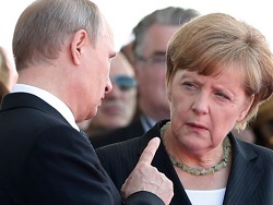 Путин пригласил Меркель посетить Россию