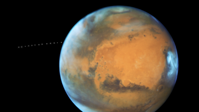 Хаббл снял на видео Фобос, вращающийся вокруг Марса