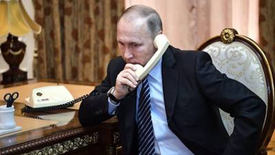 Эксперт прокомментировал разговор Путина и Порошенко